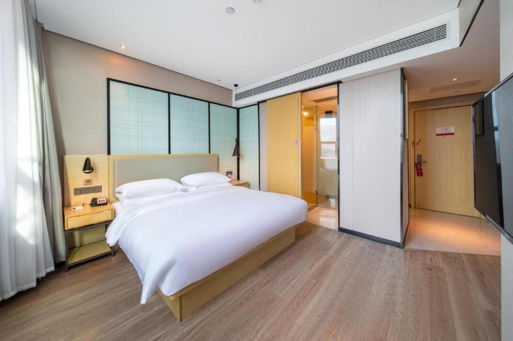 Echarm Hotel Yangjiang Baili Plaza Exterior foto