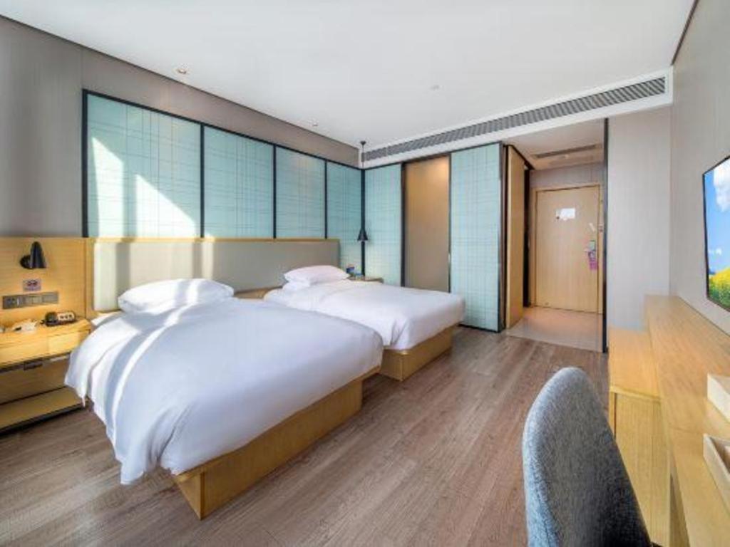 Echarm Hotel Yangjiang Baili Plaza Exterior foto
