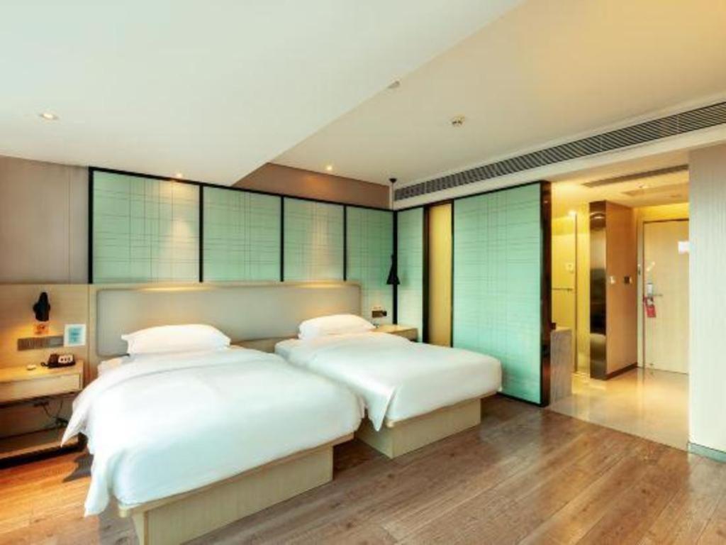 Echarm Hotel Yangjiang Baili Plaza Exterior foto
