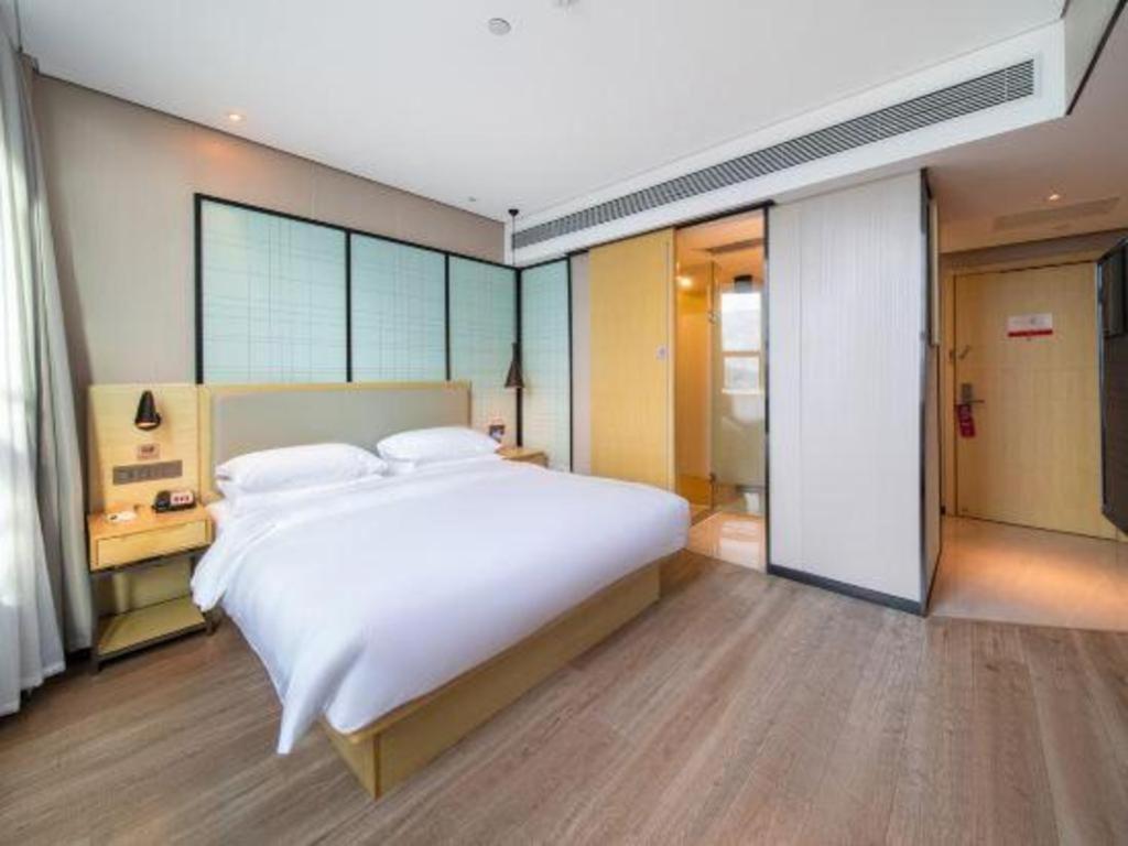Echarm Hotel Yangjiang Baili Plaza Exterior foto