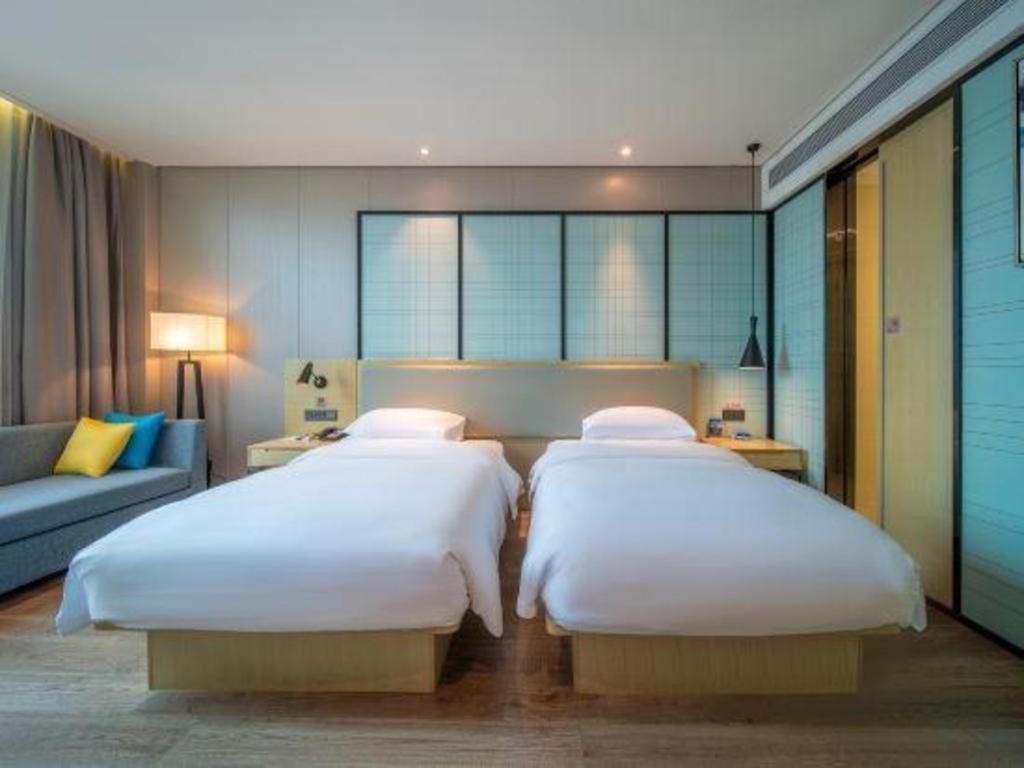 Echarm Hotel Yangjiang Baili Plaza Exterior foto