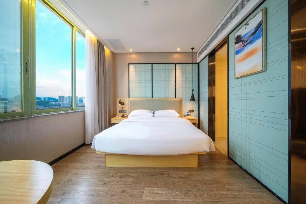 Echarm Hotel Yangjiang Baili Plaza Exterior foto